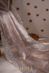 hand embroidered sequin and cutdaana work on beige organza silk saree