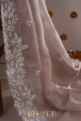 hand embroidered sequin and cutdaana work on beige organza silk saree