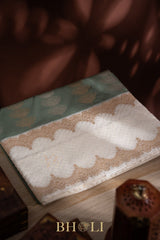 handwoven pure katan silk kaduwa buta with kora border banarasi