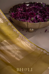 metallic striped moss yellow hand-crafted zardosi and stone work organza saree