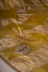 metallic striped moss yellow hand-crafted zardosi and stone work organza saree