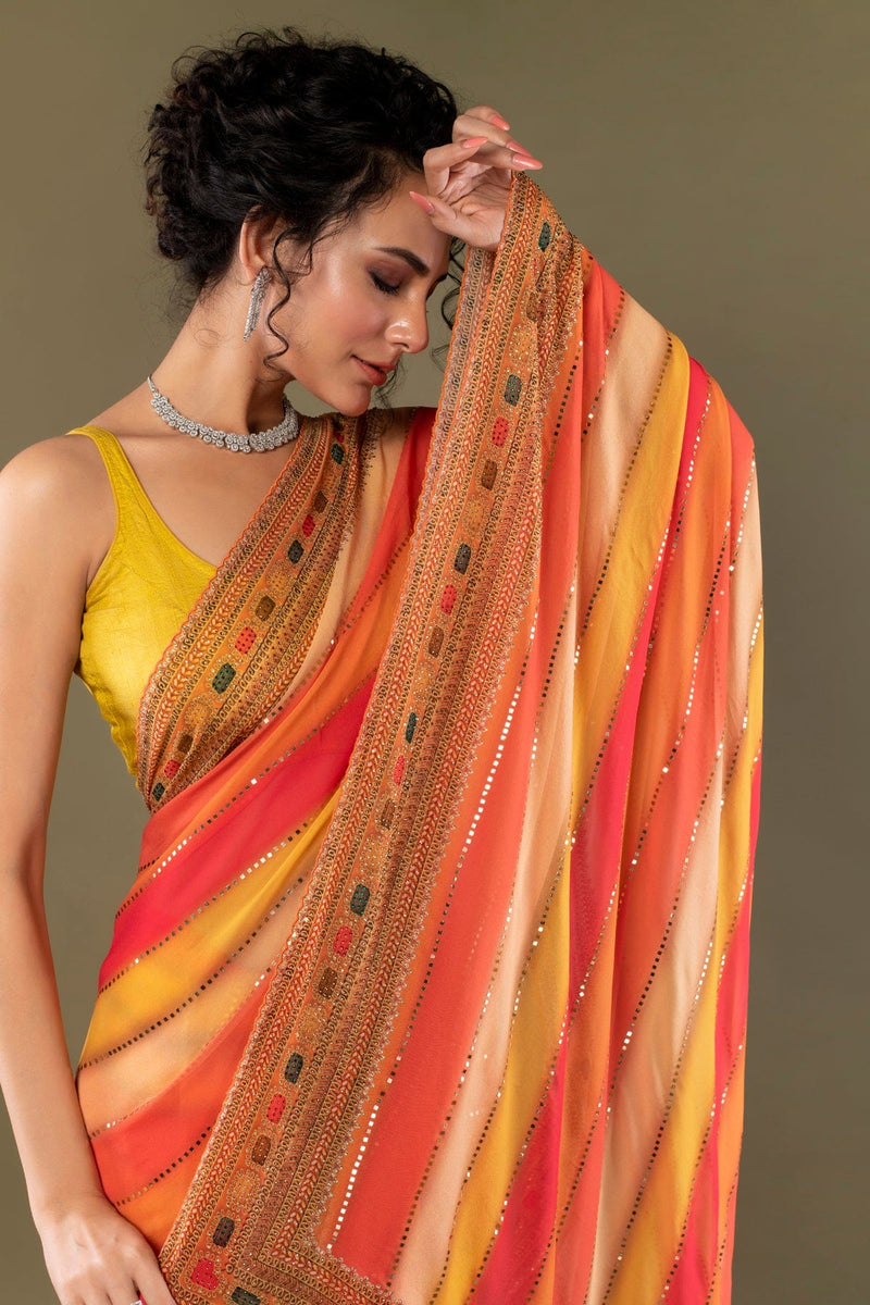 Designer orange Striped Georgette silk saree embellished with stones and mirrors