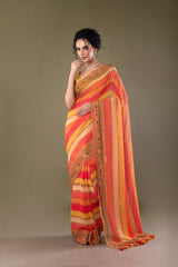 Designer orange Striped Georgette silk saree embellished with stones and mirrors